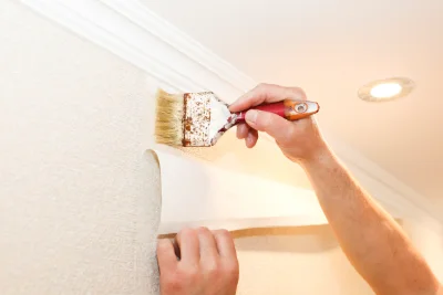 Pose de papier peint aux Repôts — revêtements muraux et toiles de verre